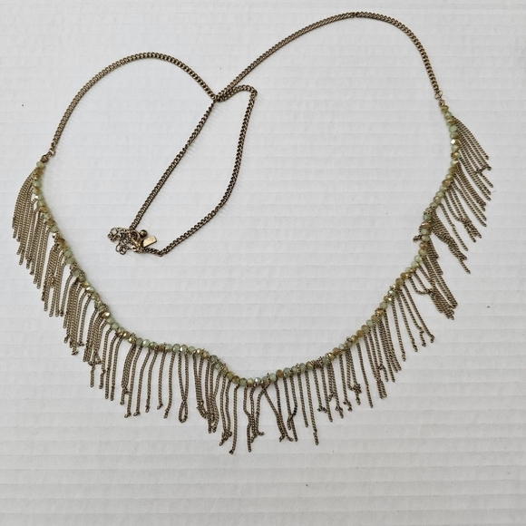 Freedom gold and green long necklace with a boho feeling fringe. - Picture 6 of 12